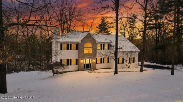 a house view with a outdoor space