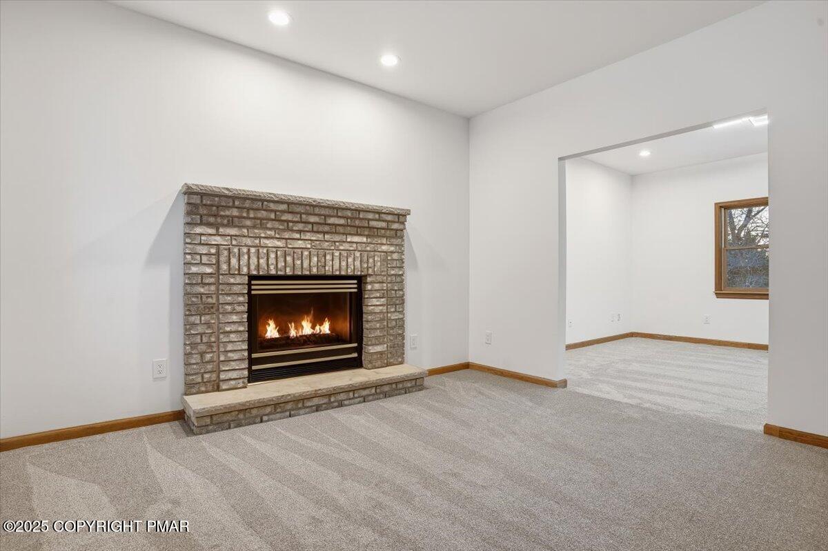 1395 Kelly Road Stroudsburg, PA 18360 - Photo 18 of 48 a view of an empty room with fire place