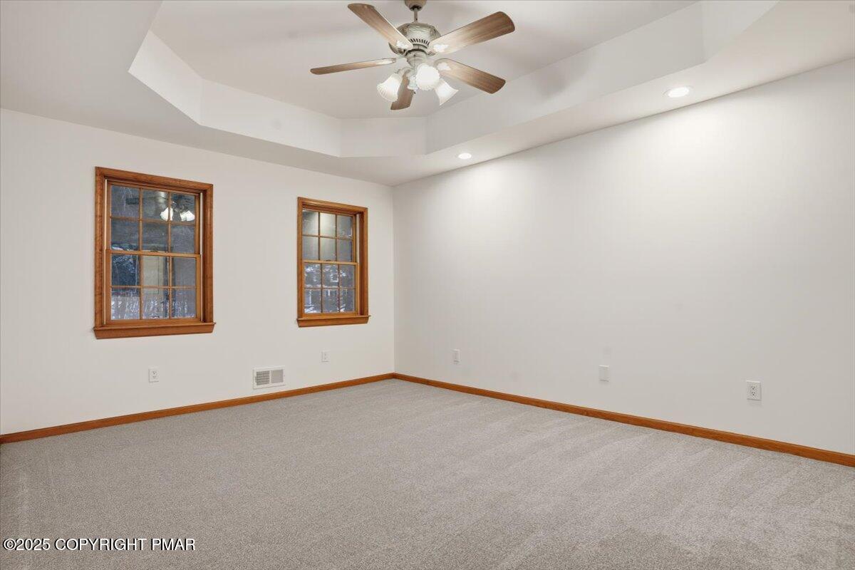 1395 Kelly Road Stroudsburg, PA 18360 - Photo 32 of 48 an empty room with windows and fan