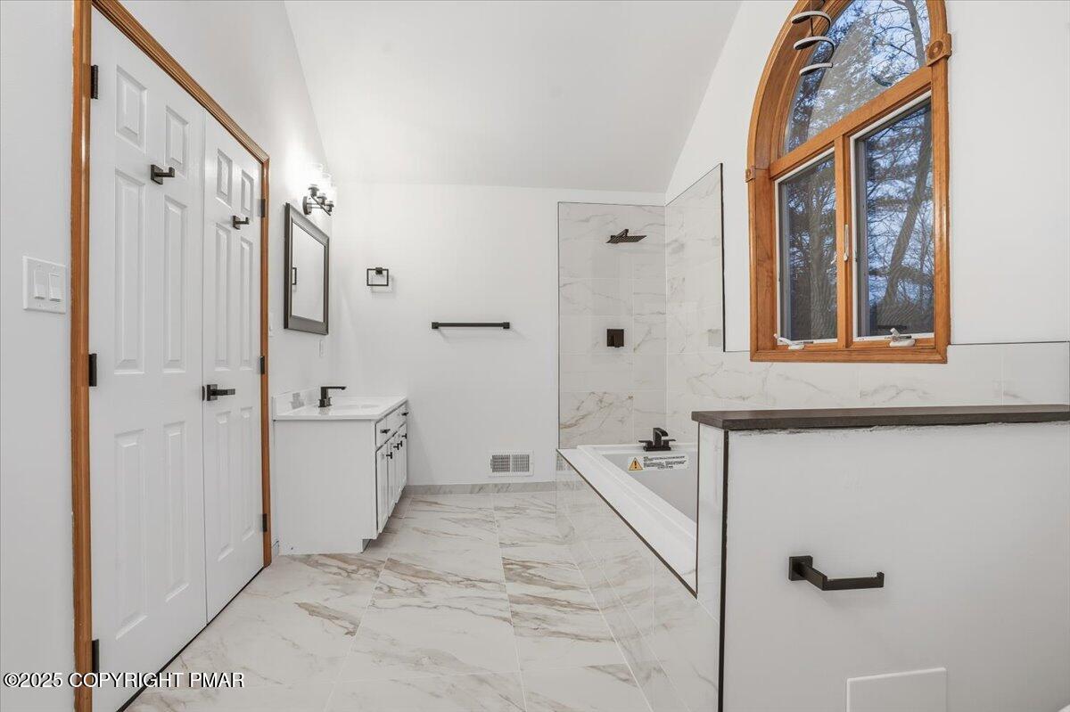 1395 Kelly Road Stroudsburg, PA 18360 - Photo 34 of 48 a bathroom with a bathtub and a shower