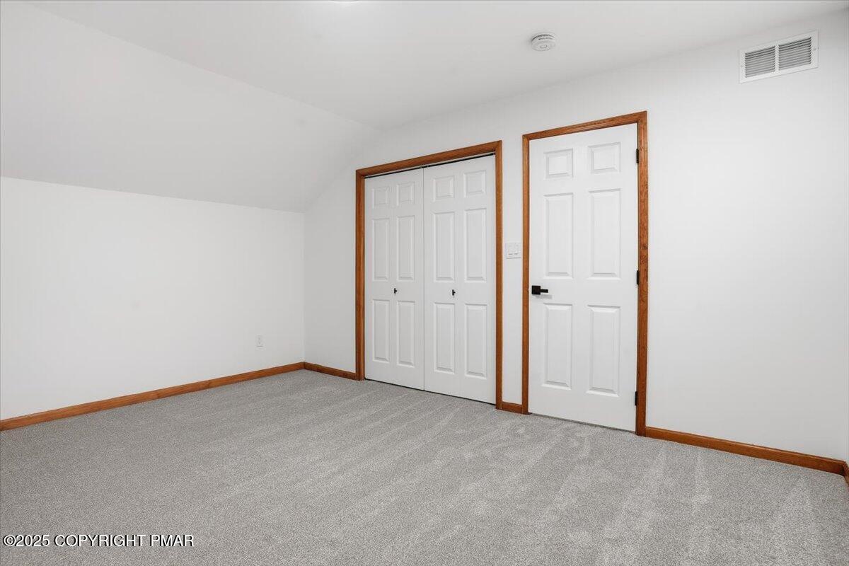 1395 Kelly Road Stroudsburg, PA 18360 - Photo 44 of 48 an empty room with an entryway door