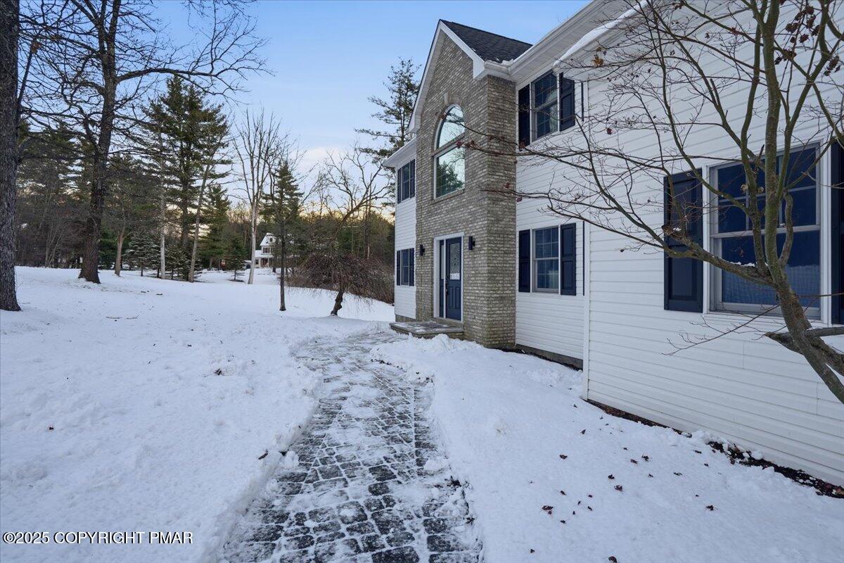 1395 Kelly Road Stroudsburg, PA 18360 - Photo 6 of 48 a view of a house with a snow