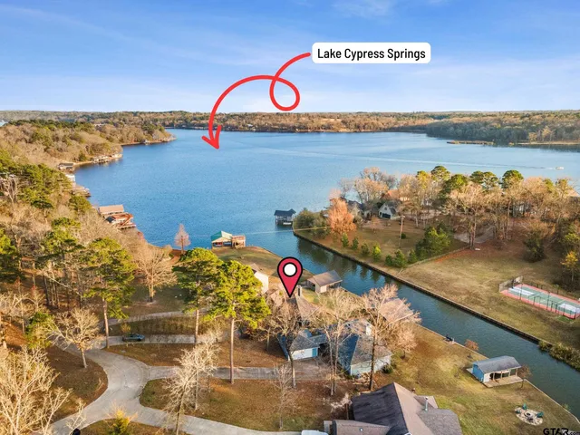 a view of a lake with a swimming pool