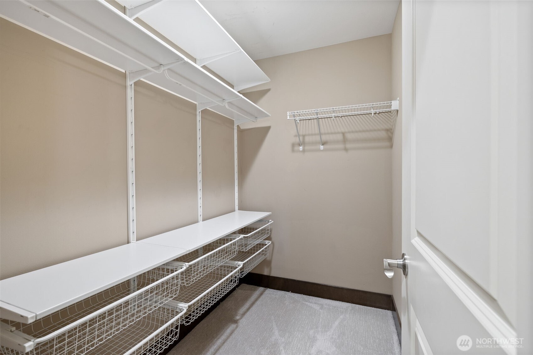 12801 218th Place Southeast Snohomish, WA 98296 - Photo 16 of 38 a room with wooden floor and white walls