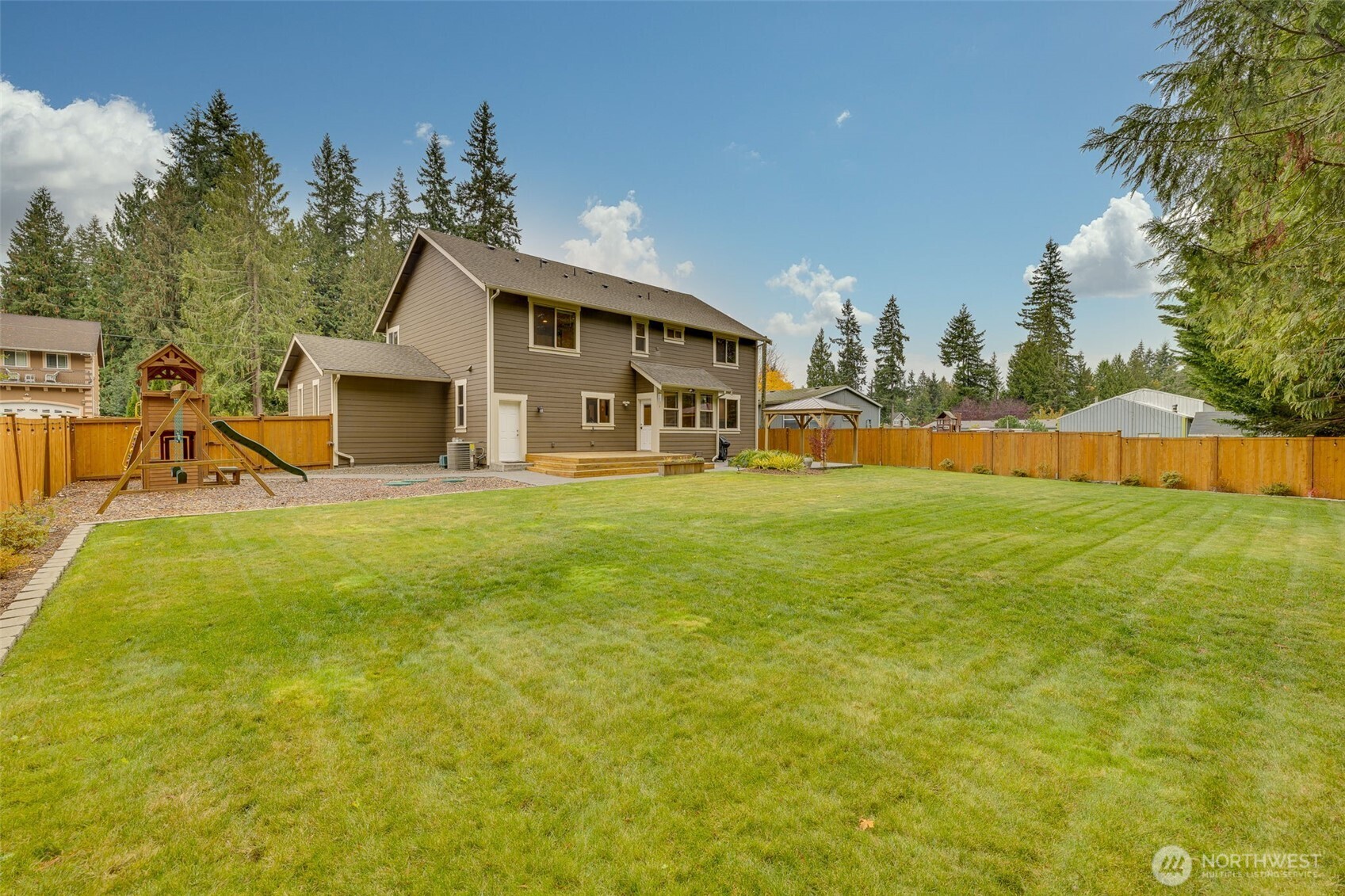12801 218th Place Southeast Snohomish, WA 98296 - Photo 28 of 38 a view of a house with a yard