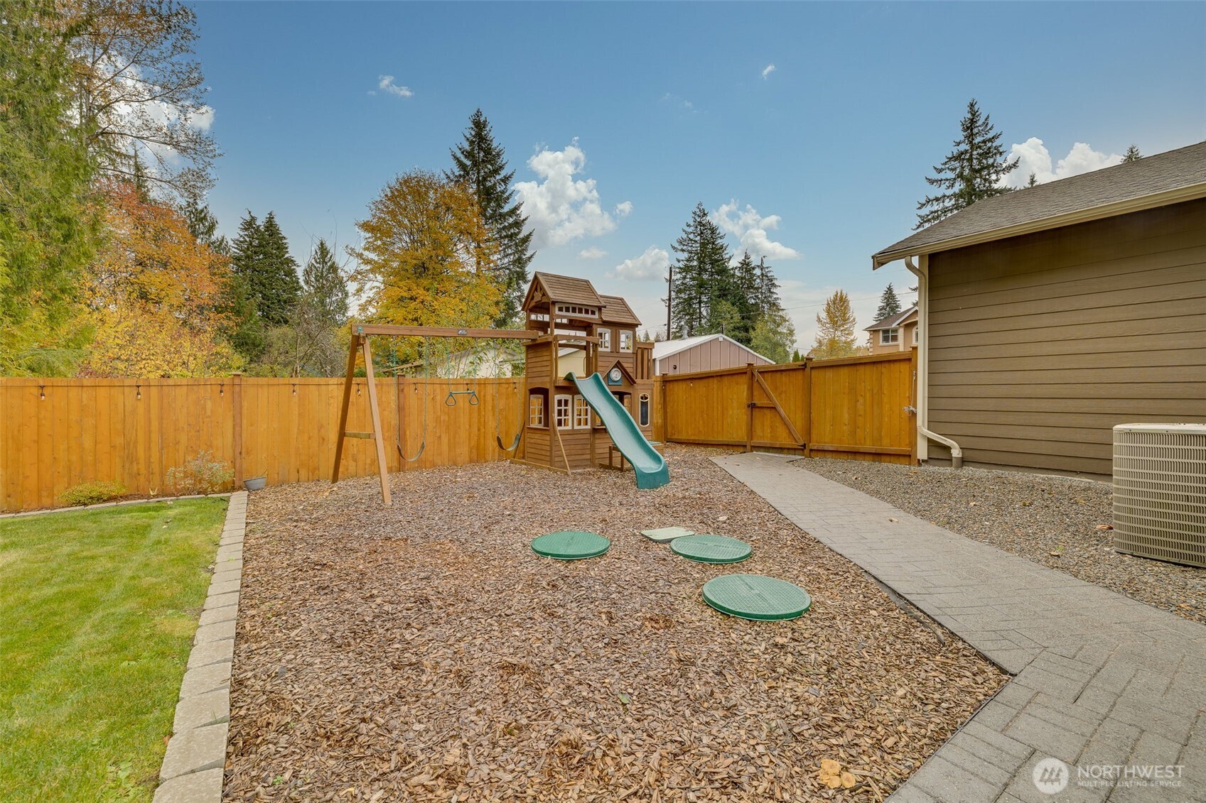 12801 218th Place Southeast Snohomish, WA 98296 - Photo 32 of 38 a view of a backyard with a slide