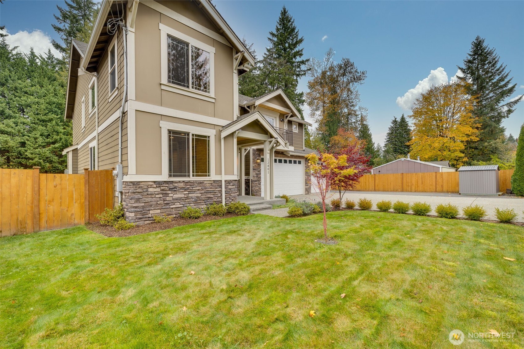 12801 218th Place Southeast Snohomish, WA 98296 - Photo 34 of 38 a front view of a house with a yard