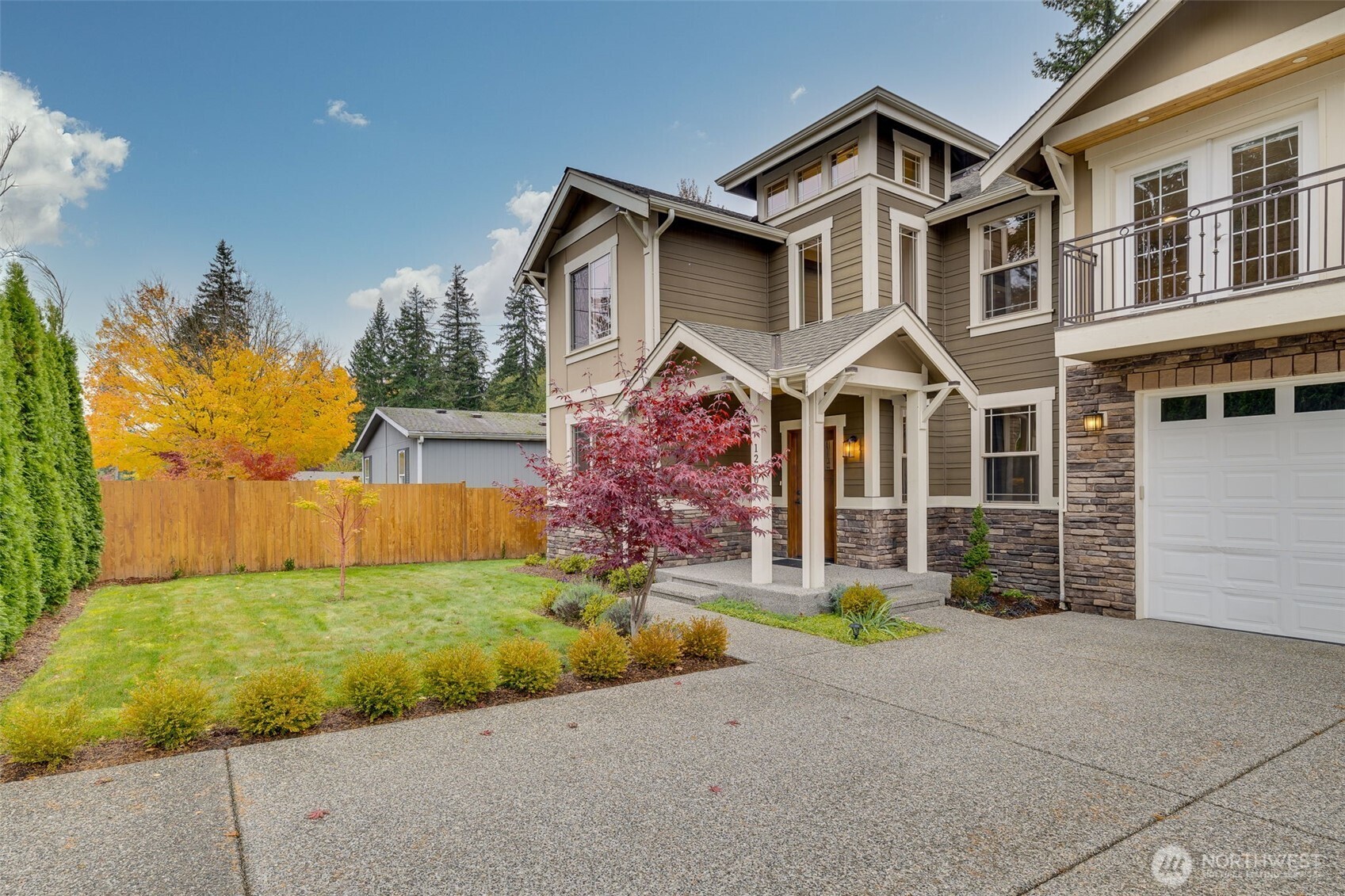 12801 218th Place Southeast Snohomish, WA 98296 - Photo 36 of 38 a front view of a house with garden