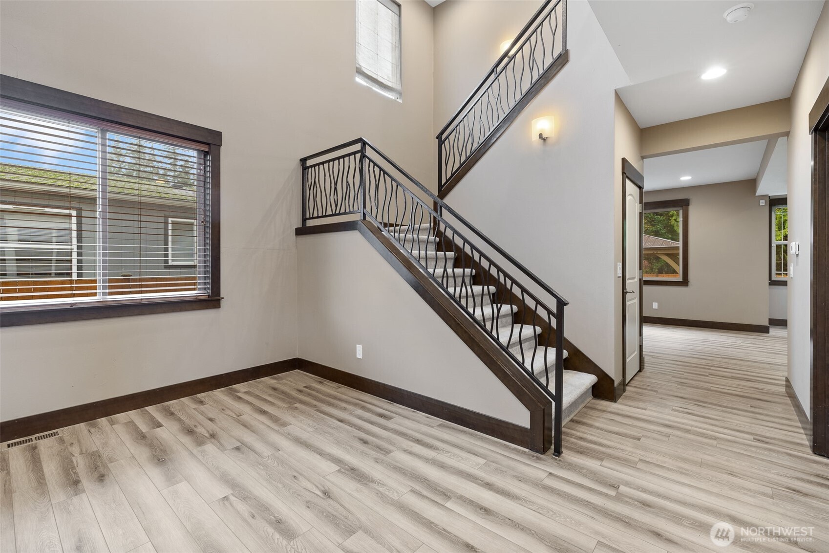 12801 218th Place Southeast Snohomish, WA 98296 - Photo 10 of 38 a view of an entryway with wooden floor and stairs