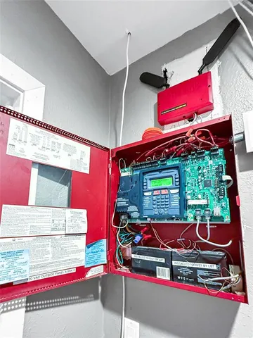 a balcony with wooden floor and fence