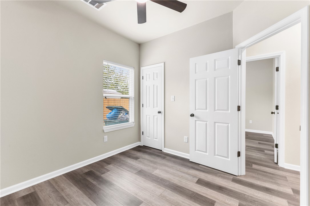 1601 West 17th Street Bryan, TX 77803 - Photo 15 of 16 an empty room with windows