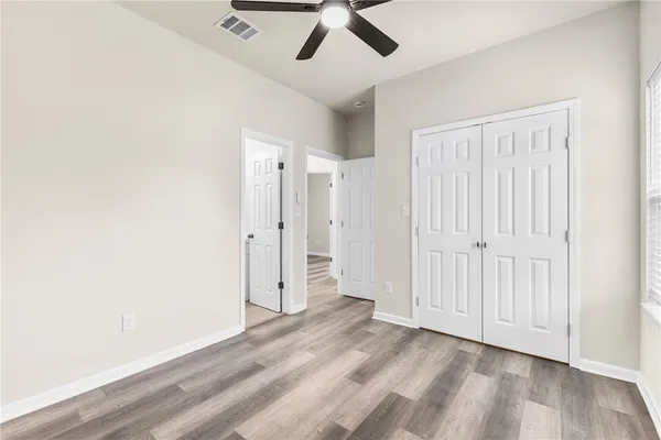 a view of a livingroom with wooden floor