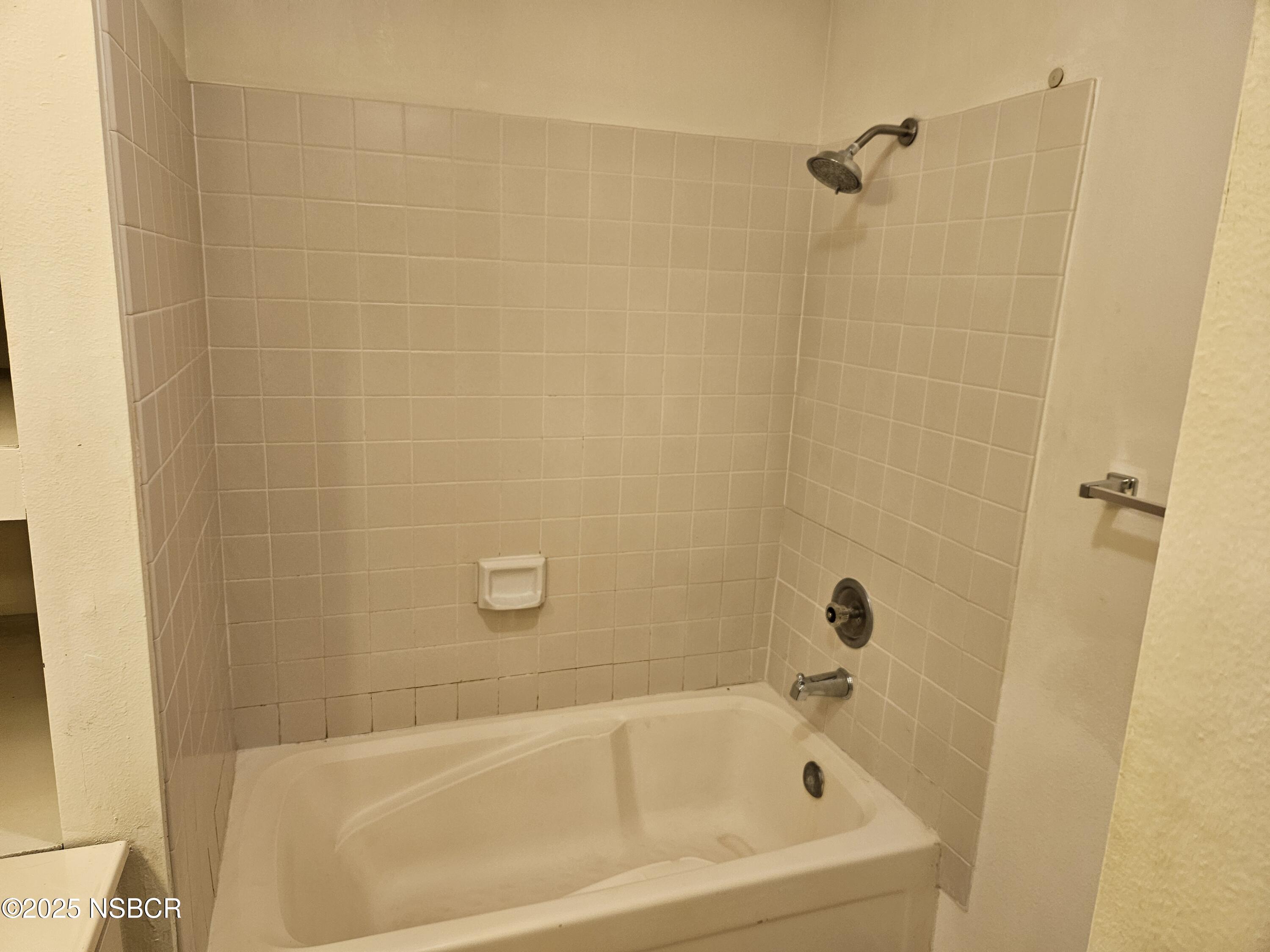 812 Del Rey Lane Santa Maria, CA 93454 - Photo 8 of 12 a white bath tub and a shower