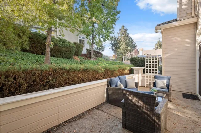 a view of outdoor sitting area with furniture