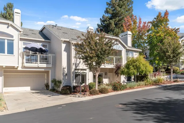 a view of a house with a street