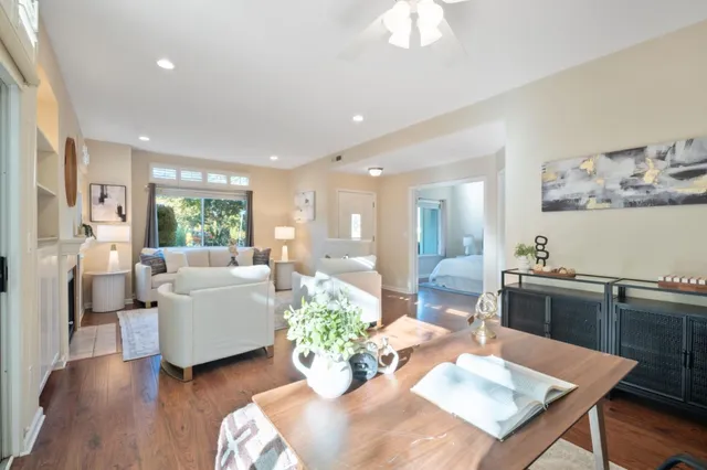 a living room with furniture dining table and a couch