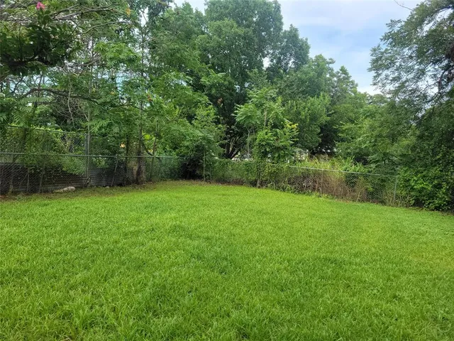 a view of a yard with a trees