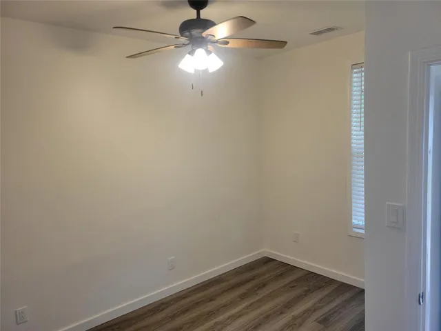 a view of a small space with a fan