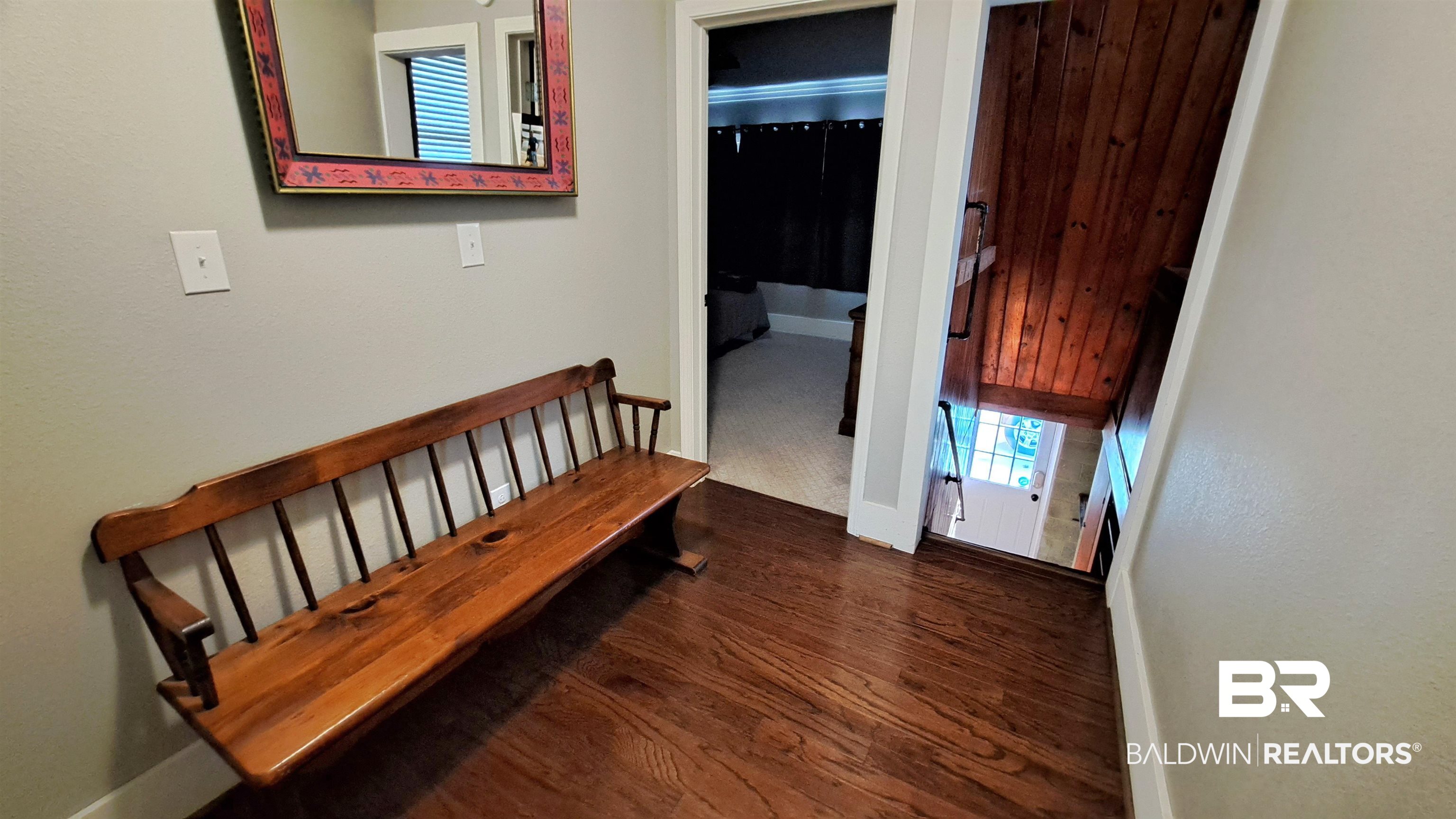 110 South Main Street Evergreen, AL 36401 - Photo 21 of 27 Hardwood flooring provides a consistent material palette for interior spaces