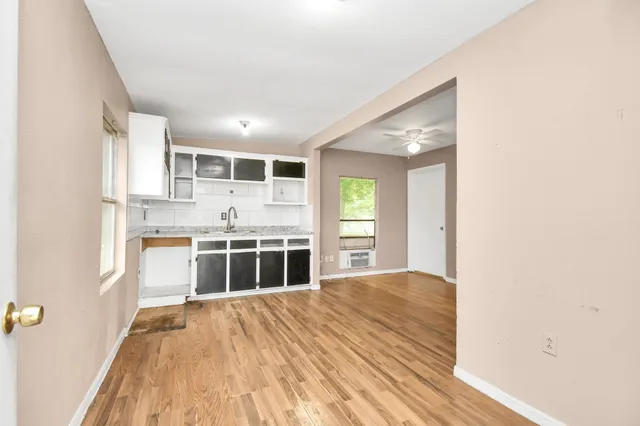 a kitchen with stainless steel appliances granite countertop a stove and a sink