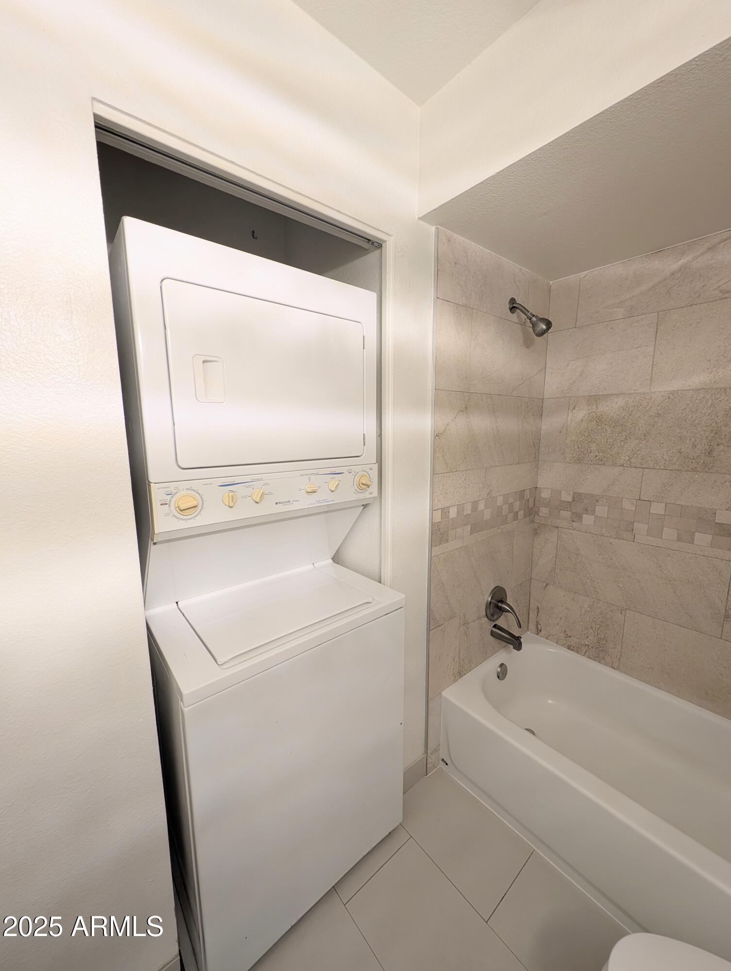 Undisclosed Address Chandler, AZ 85225 - Photo 16 of 21 a bathroom with a sink a mirror and a bathtub