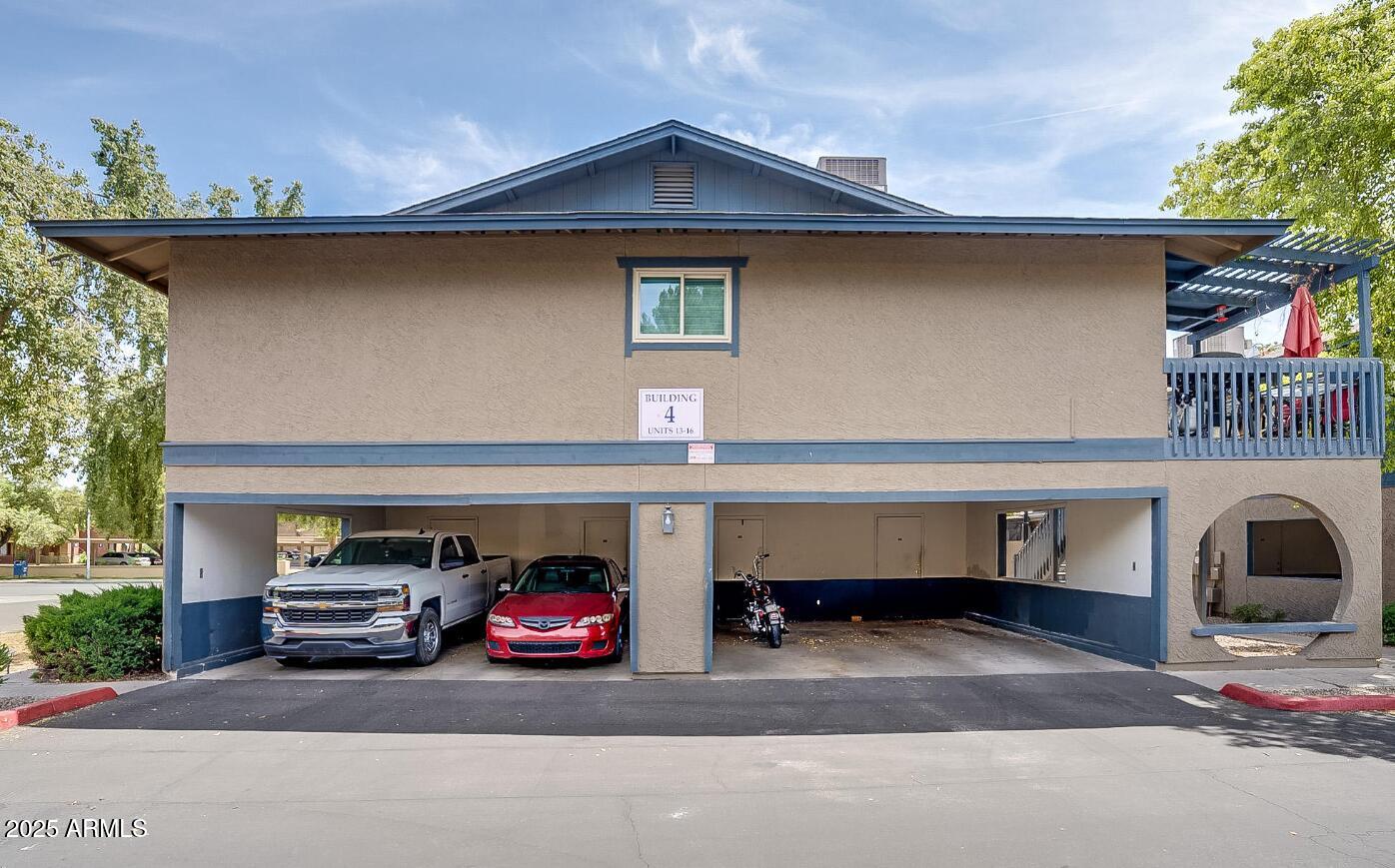 Undisclosed Address Chandler, AZ 85225 - Photo 19 of 21 a car parked in front of a building