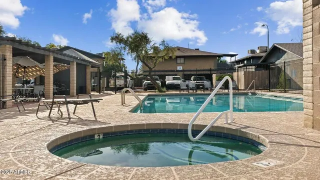 a view of a backyard with a patio