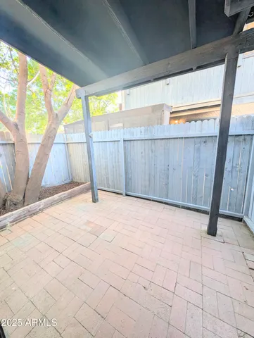 a view of a backyard of the house