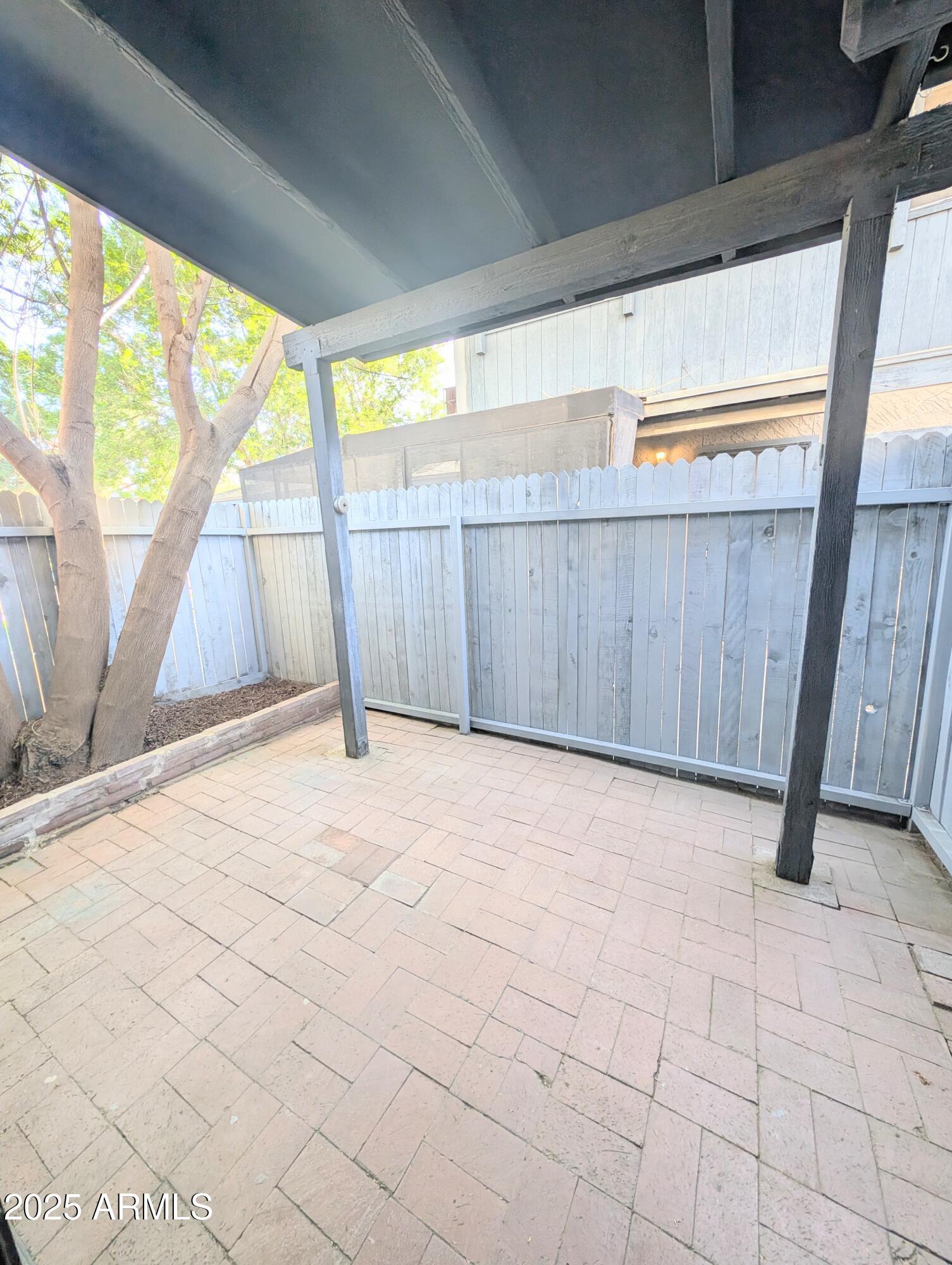 Undisclosed Address Chandler, AZ 85225 - Photo 4 of 21 a view of a backyard of the house