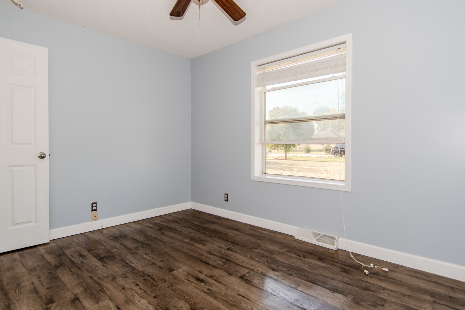 2970 North Dwight Road Morris, IL 60450 - Photo 11 of 43 an empty room with wooden floor and windows