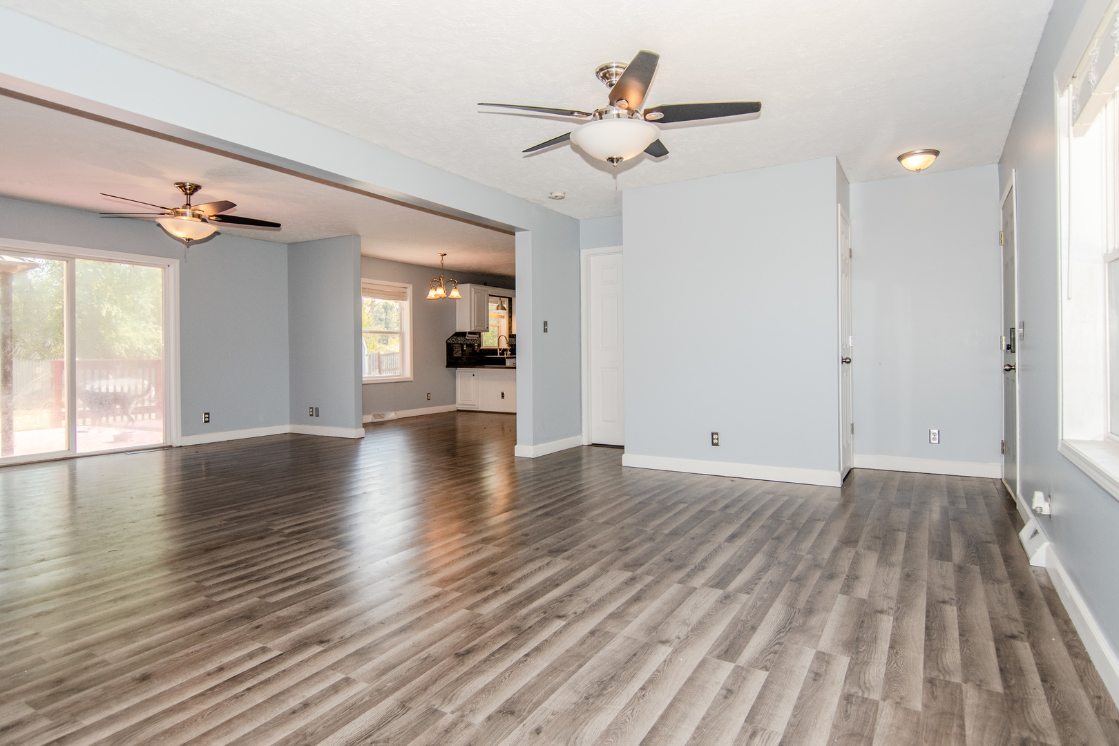 2970 North Dwight Road Morris, IL 60450 - Photo 17 of 43 a view of an empty room with wooden floor and a window