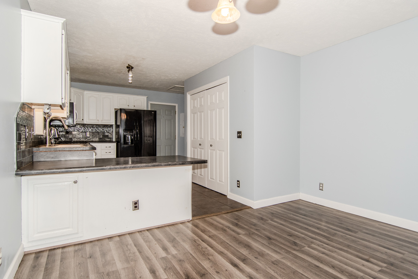2970 North Dwight Road Morris, IL 60450 - Photo 25 of 43 a kitchen with granite countertop a sink and cabinets