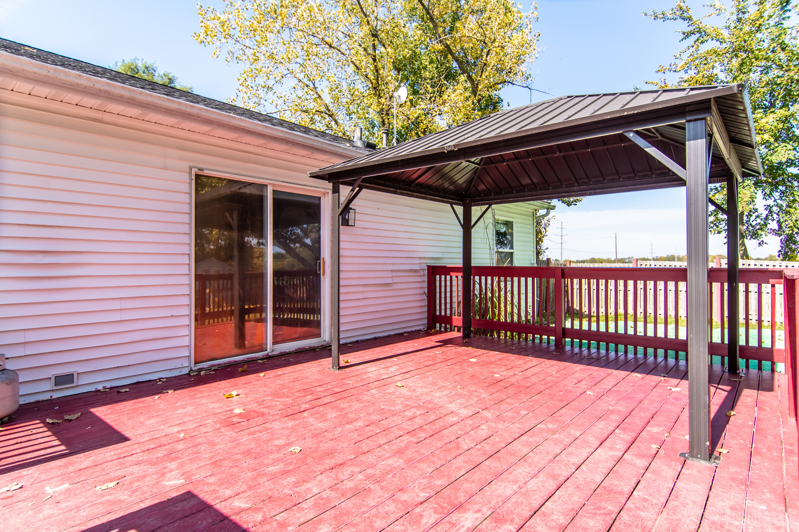 2970 North Dwight Road Morris, IL 60450 - Photo 40 of 43 a view of a backyard with a deck and wooden floor
