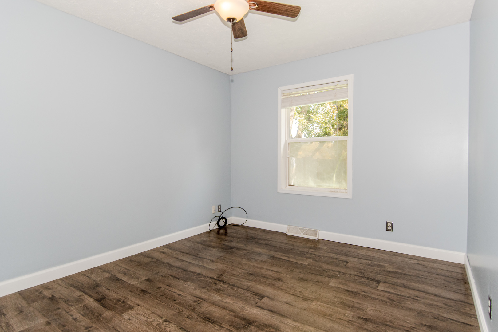 2970 North Dwight Road Morris, IL 60450 - Photo 8 of 43 a view of empty room with wooden floor and fan