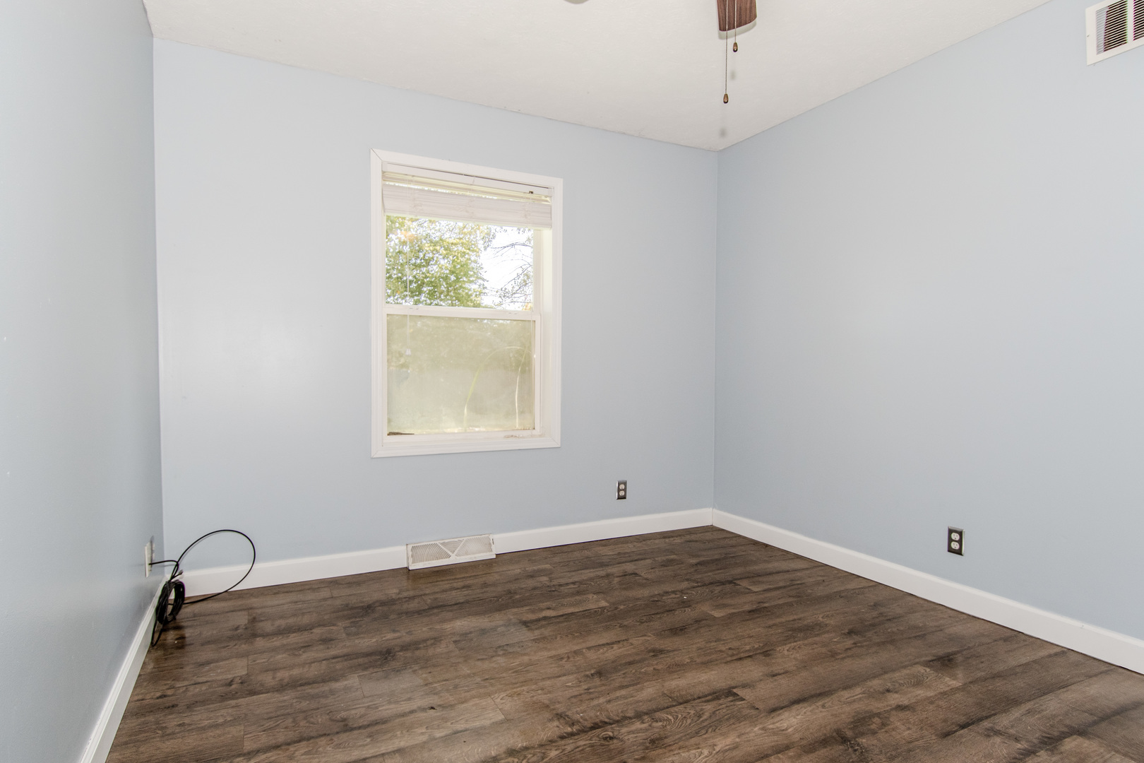 2970 North Dwight Road Morris, IL 60450 - Photo 10 of 43 a room with a window and wooden floor