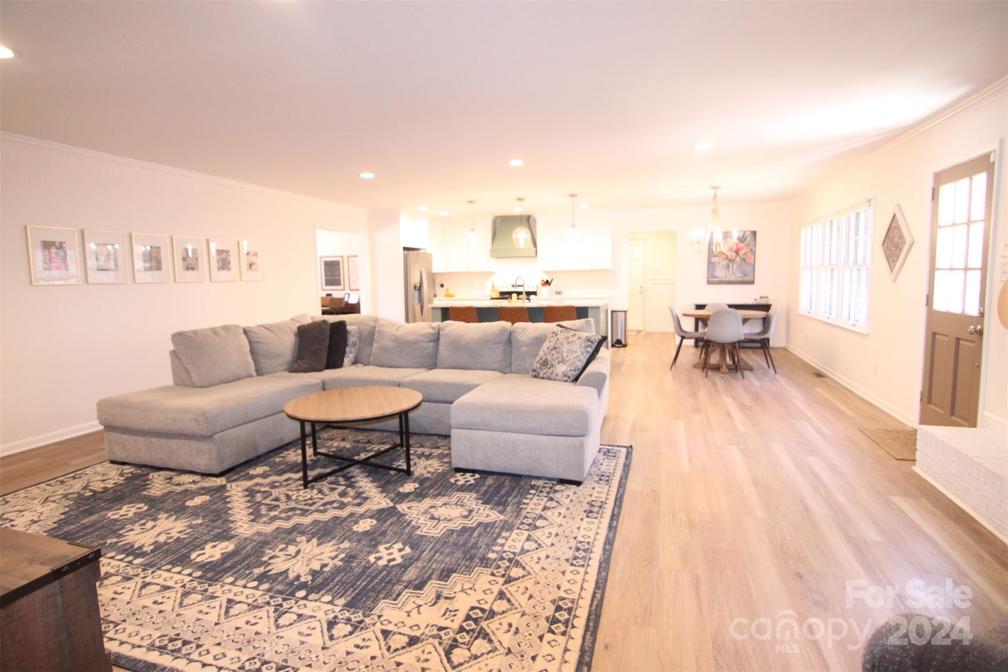 737 Miles Road Dallas, NC 28034 - Photo 26 of 47 a living room with furniture and a wooden floor