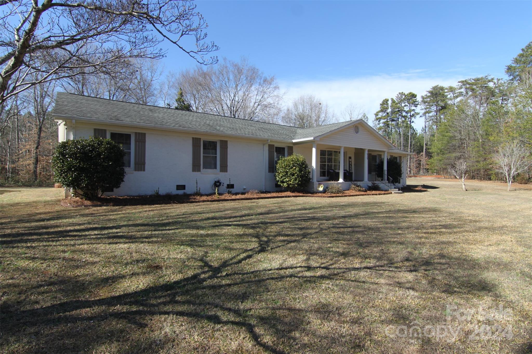 737 Miles Road Dallas, NC 28034 - Photo 46 of 47 a view of a house with a yard