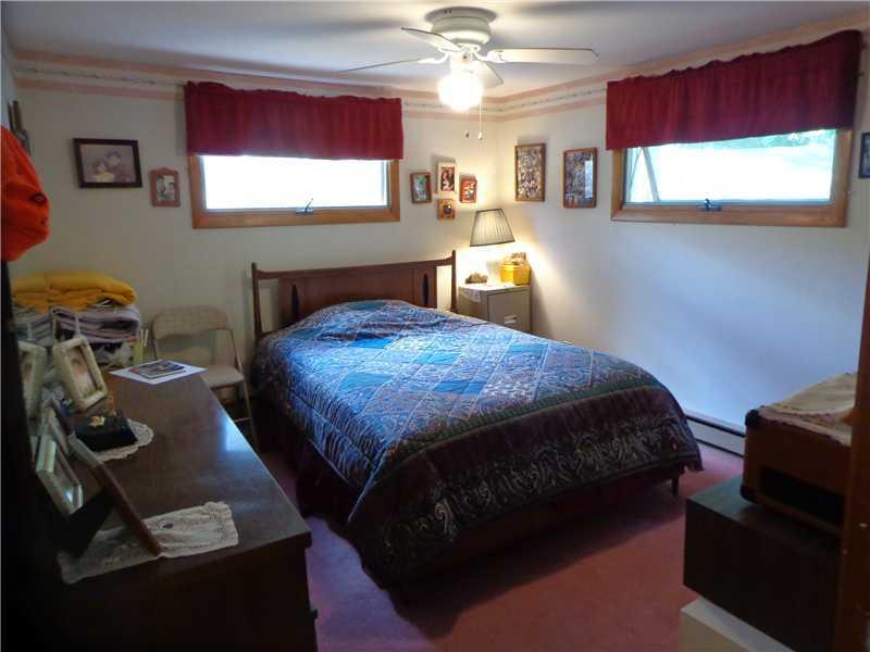 74 Deer Acres Road Raymond, ME 04071 - Photo 17 of 35 Master Bedroom. Top level has two...