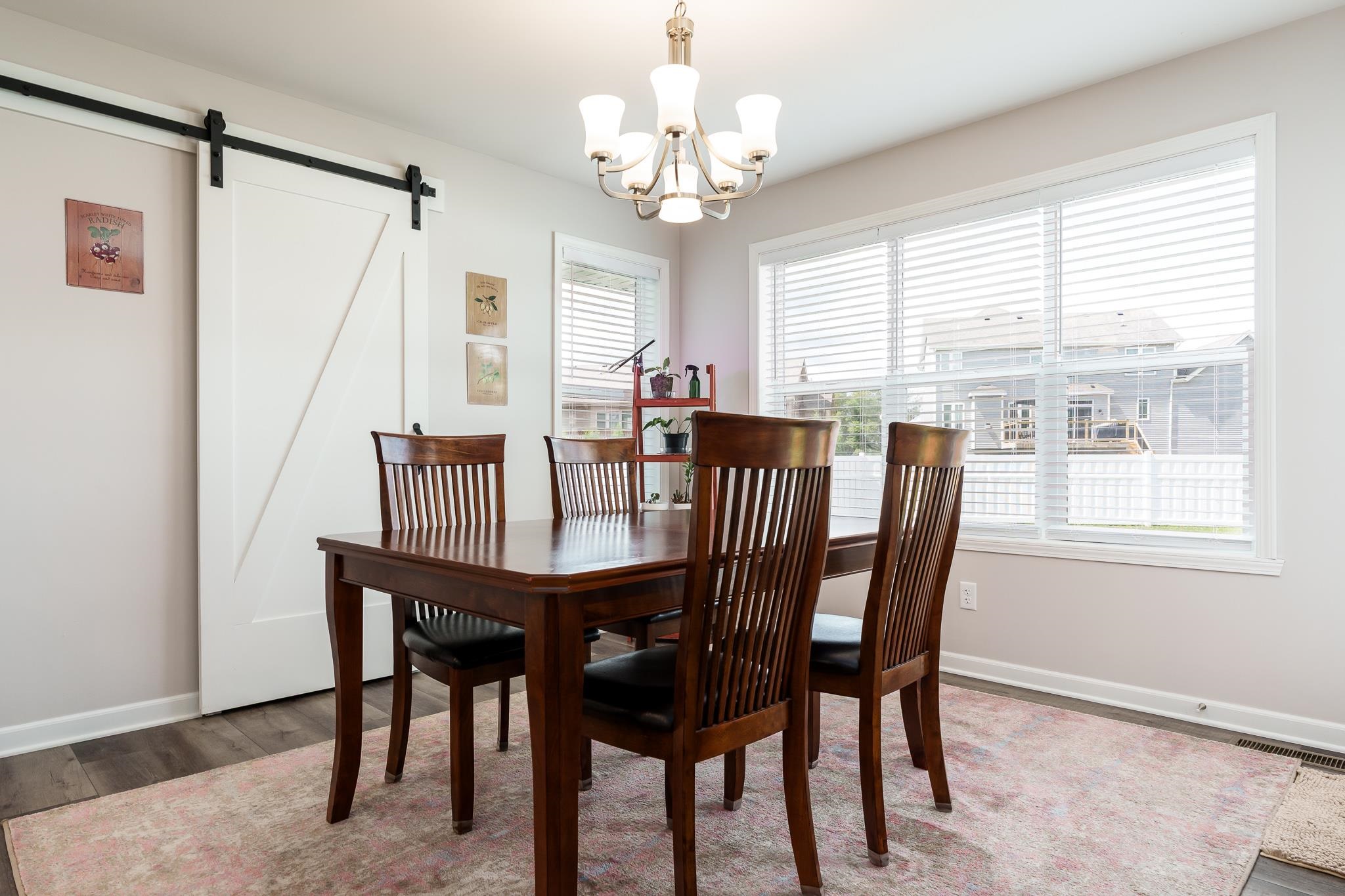 779 Boz Way Belvidere, IL 61008 - Photo 13 of 39 a view of a dining room with furniture window and outside view