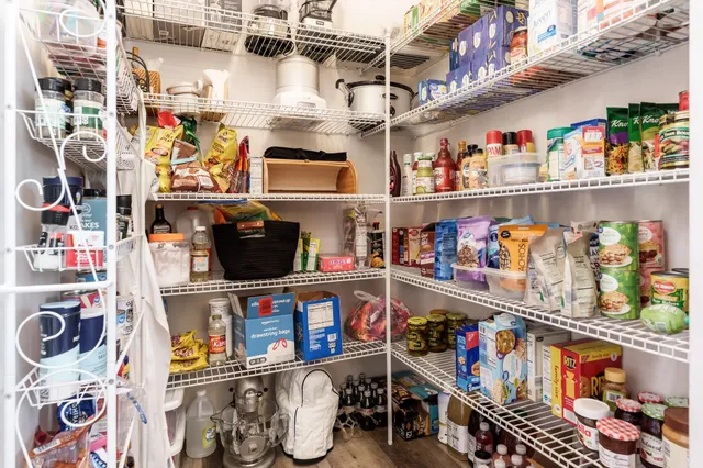 a store room with lots of different colored cloths