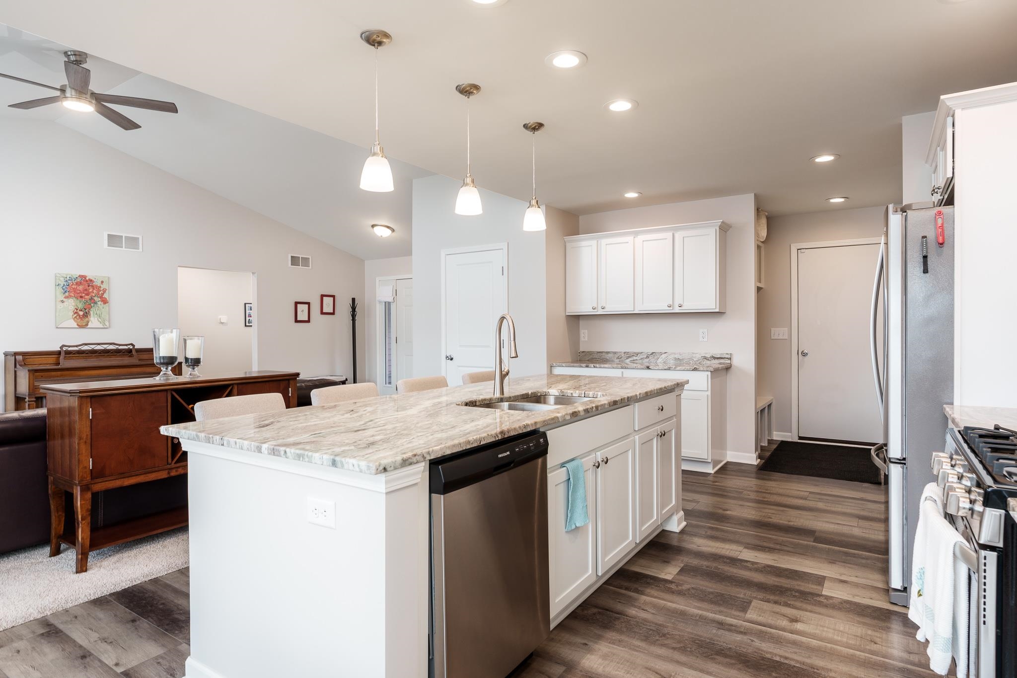 779 Boz Way Belvidere, IL 61008 - Photo 28 of 39 a kitchen with a sink a counter top space and stainless steel appliances