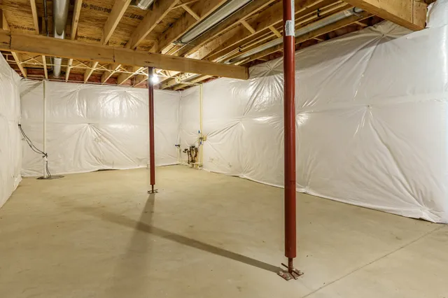 a view of a room with wooden walls