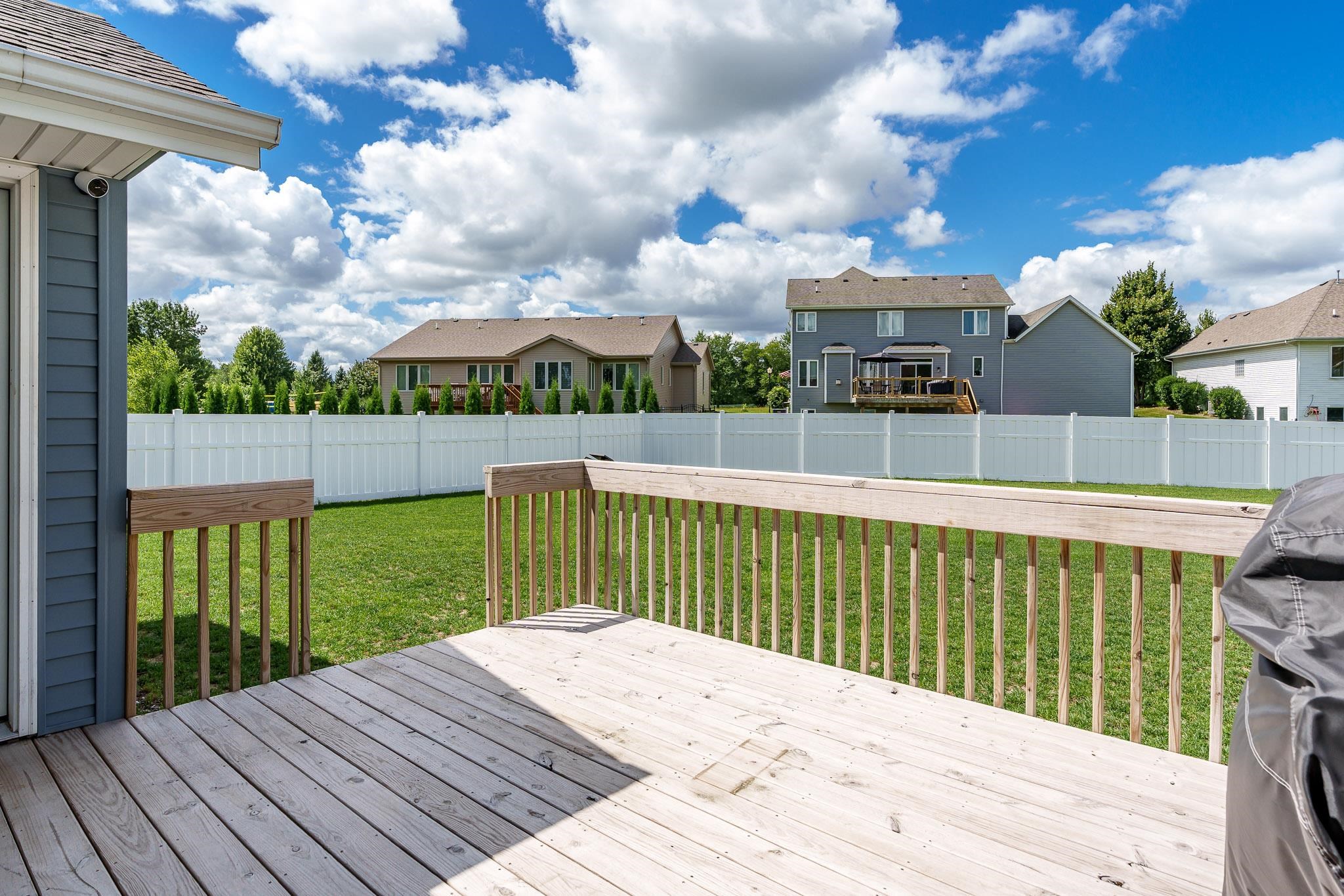 779 Boz Way Belvidere, IL 61008 - Photo 34 of 39 a view of a wooden deck and a yard