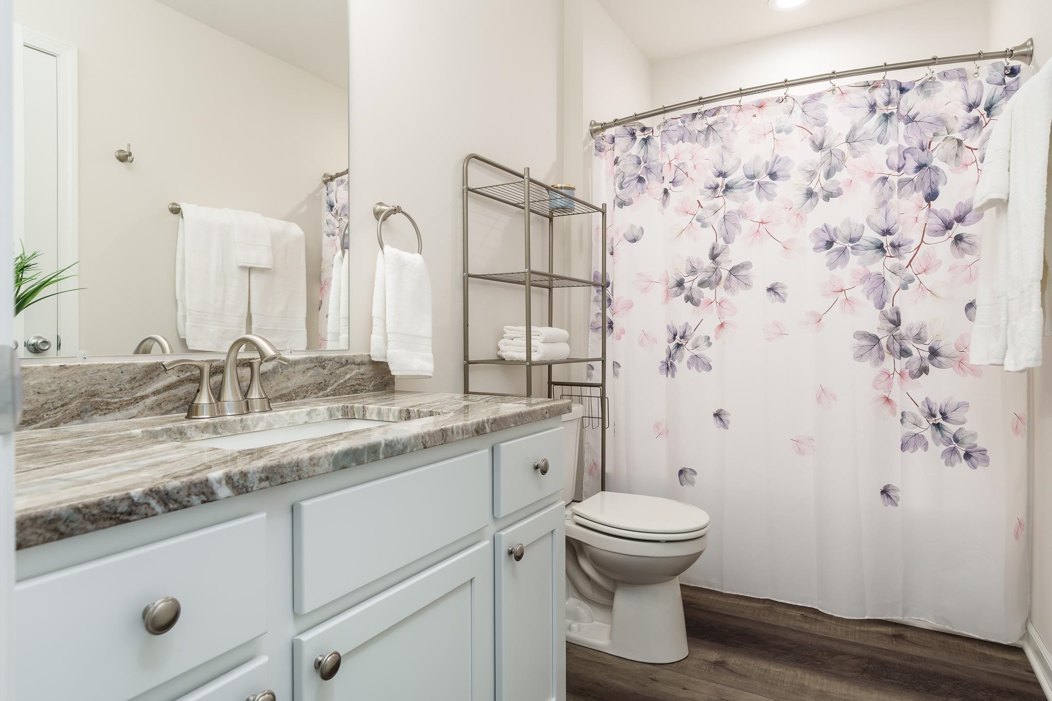 779 Boz Way Belvidere, IL 61008 - Photo 6 of 39 a bathroom with a granite countertop sink toilet and shower