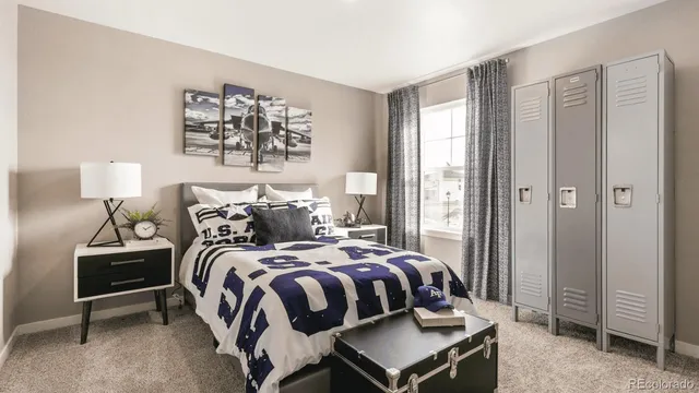 a bedroom with a bed and a night stand