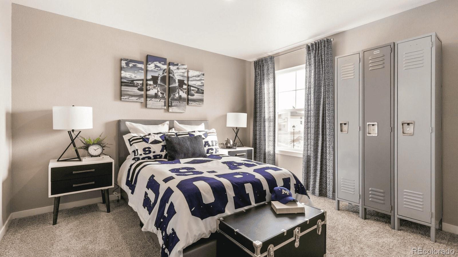 810 North Clubview Street Watkins, CO 80137 - Photo 14 of 21 a bedroom with a bed and a night stand