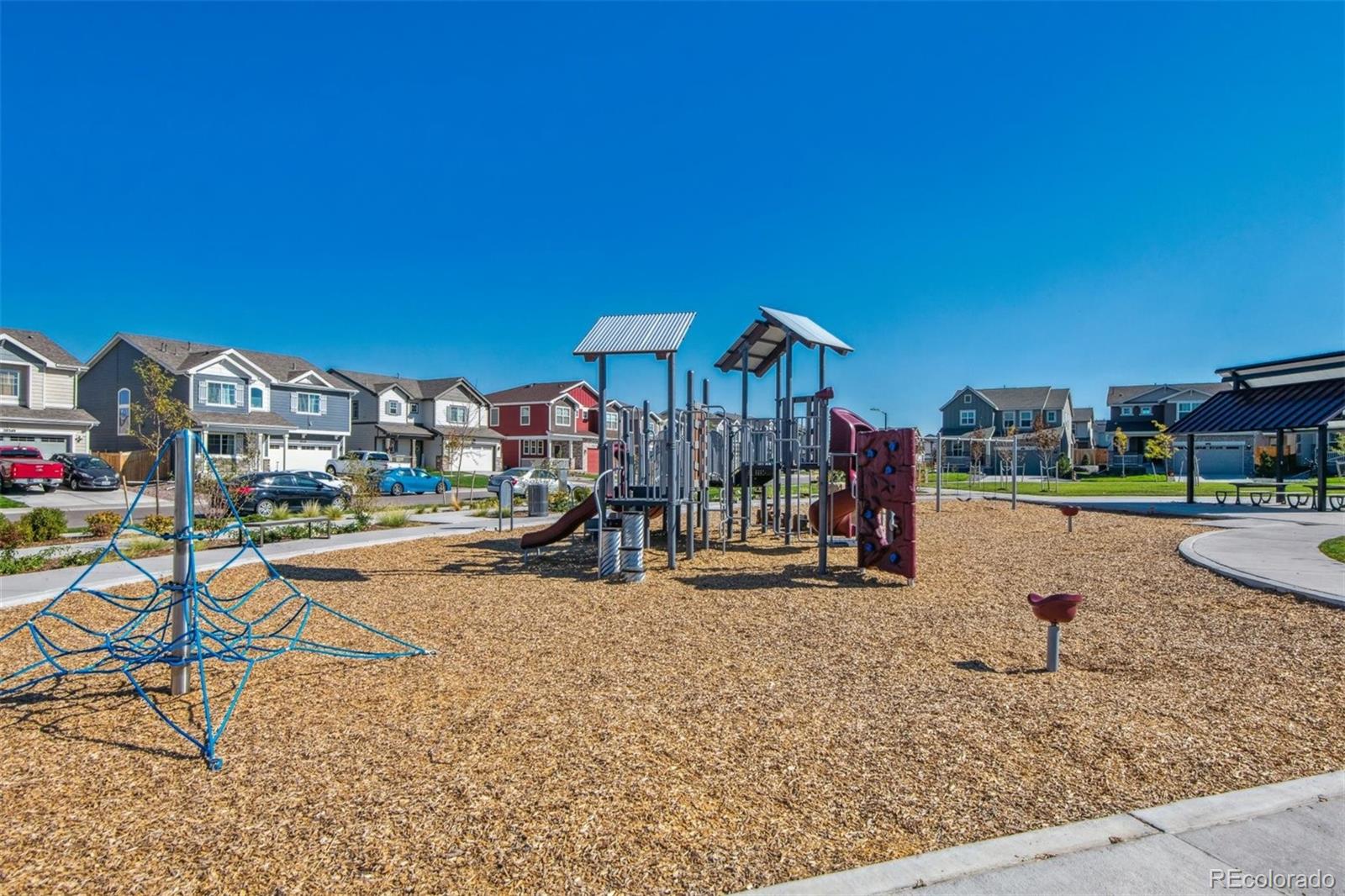 810 North Clubview Street Watkins, CO 80137 - Photo 18 of 21 a view of a house with a yard and sitting area