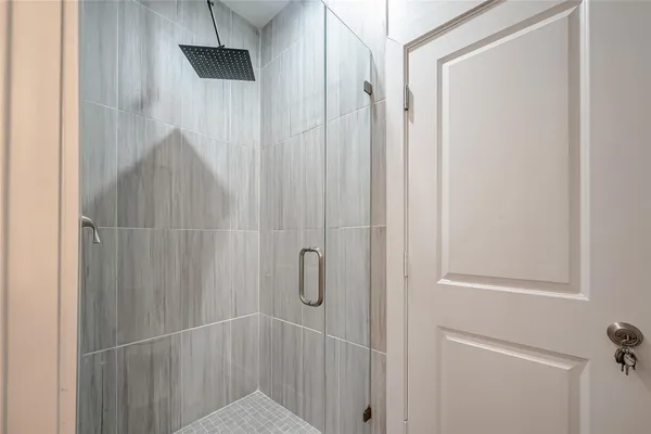 a white bath tub sitting in a bathroom