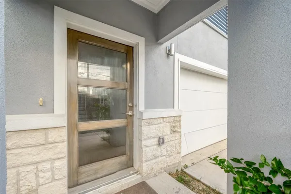 a view of a room with wooden floor and stairs