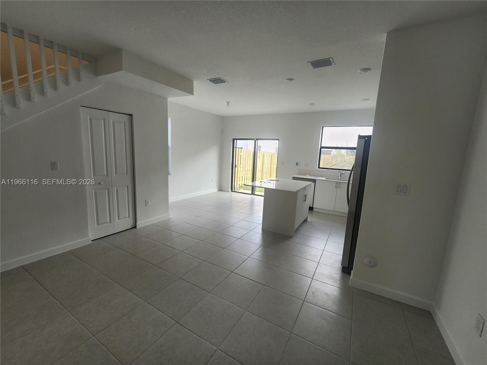 23331 Southwest 128th Avenue, Unit 23331 Homestead, FL 33032 - Photo 3 of 16 a view of a windows and a bathroom with a sink
